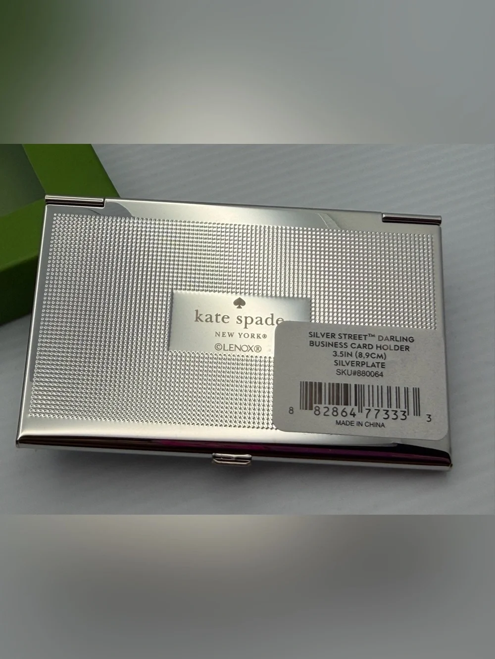 kate spade silver “darling” metal card case